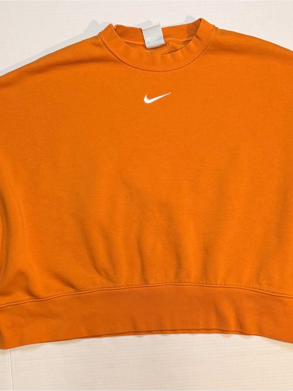 Nike Women’s Orange Crewneck Cropped Sweatshirt with Center White Swoosh